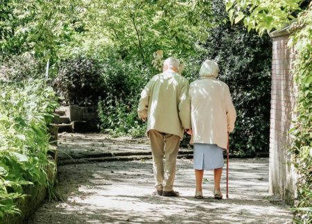 Photo of older couple walking